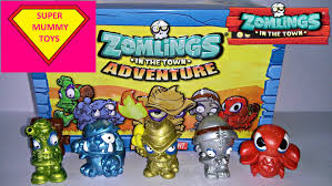 Zomlings In The Town Adventure Collector Tin Opening Toy Review With Exclusive Metallic Zomlings Video Game Rooms Unboxing Videos Toys