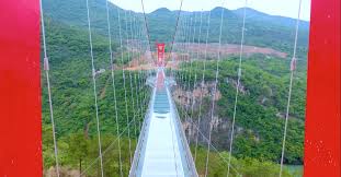 Chinese engineers have something of a penchant for glass bottomed walkways and previously completed a similar but smaller bridge in the shiniuzhai national park. This Glass Bridge In China Is Officially The Longest One In The World