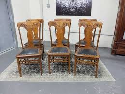 With solid oak dining room furniture, you can give the space a unique, cozy look. Antiques By Design Solid Quarter Sawn Oak Press Back Dining Chairs Antique Dining Room Chairs Dining Chairs Antique Dining Tables