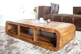 Enjoy the lovely grain of this rectangular dining table's generous mango wood top and cylindrical legs. Wooden Centre Table Designs Modern Designs For You Homonk