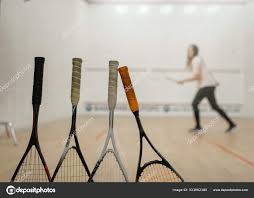 squash rackets female player court