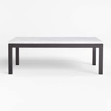 The centrepiece of any well appointed living room, the right coffee table makes all the difference when it comes to redecorating your home. Parsons White Marble Top Dark Steel Base 48x28 Small Rectangular Coffee Table Reviews Crate And Barrel