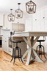 If you like to think you are a regular rachel ray or bobby flay when it comes to creating a meal, then you might consider setting your island at 42″ bar height —provided your surround offers adequate prep space. Dining Table Next To Kitchen Island Design Ideas