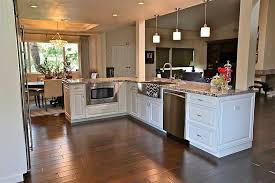 A connected kitchen and dining area make for easy serving. Pin By Jen Pakel On House Kitchen Remodel Layout Kitchen Renovation Kitchen Layout