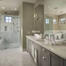 Greige Bathroom With Grey Vanity And Curbless Walk In Shower Flooring Is Hex Kacy Polished Marble Ligh Greige Bathroom Cheap Bathroom Remodel Bathroom Design