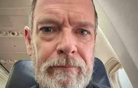 Who is Adam Woodyatt's ex wife Beverley Sharp?