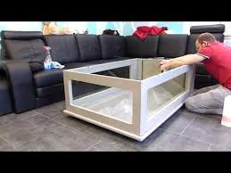 A glass fish tank table is a great way to turn your aquarium into a functional centerpiece of your living room. Building An Awesome Aquarium Coffee Table Youtube Fish Tank Coffee Table Aquarium Coffee Table Diy Coffee Table