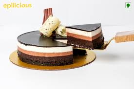 Heat and stir over low heat until gelatin is completely dissolved; Triple Chocolate Mousse Cake Epilicious