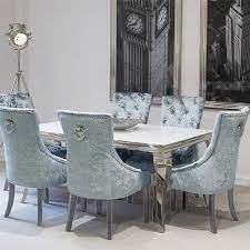 On the back you will find a lions head knocker in chrome and an additional studded design. Louis White Dining Table With 4 Pewter Knocker Back Chairs Cheshire Home Interiors White Glass Dining Table Glass Dining Table Dining Chairs For Sale