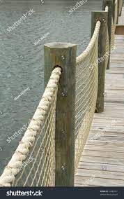 It works exactly like the wooden ladder, however, it can also be retracted and extended. Using Rope Net For Deck Railing Home Improvement Stack Exchange