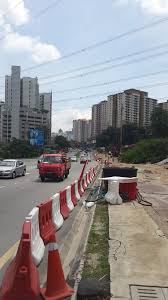 A traffic management plan template is used when planning safe traffic and work zones during roadside construction activities. Muhibah Konsortium Holdings