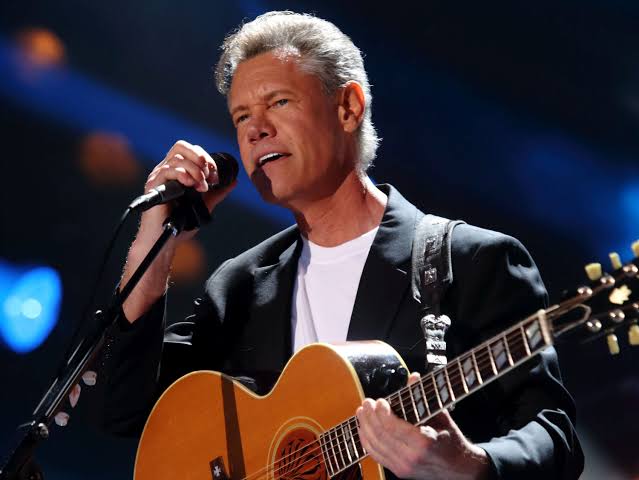 Doctors: Randy Travis awake after stroke