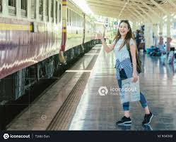 Premium Asia Woman Traveler Feeling Happiness And Greeting Her Friend Before Go To Travel At The Train Station Photo Download In Png Jpg Format Female Travel Train Station Women