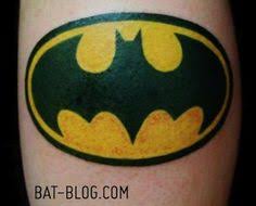 Watercolor batman logo tattoo on the right inner arm. 10 Batman Tattoo Ideas Batman Tattoo Batman Batman Logo Tattoo