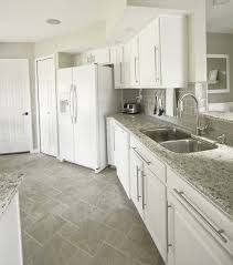 Gray Floors Gray Glass Subway Back Splash Home Kitchens White Kitchen Appliances Kitchen Flooring