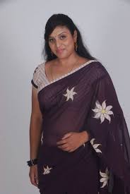 In this photos, the aunty looks like 30 years old that she is wearing the full saree in yellow, black, green, blue, etc. Telugu Supporting Actress Uma Hot Saree Photoshoot Stills New Movie Posters