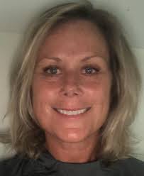 Dutmers steps up to coach Trojans