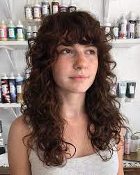 There are numerous variations on the hairstyles for curly hair with fringe, however that's the basic idea: 28 Cute Long Curly Hairstyles For 2021 Easy Curly Hair Ideas