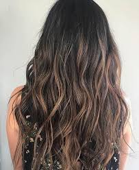 The wide world of changing one's natural hair in some fashion dates back to ancient times. Caramel Balayage Highlights On Brown Hair