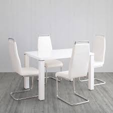 Its currently wrapped up and in our shed securely, i cant find a picture of it in our home hence pics taken. Alaska 4 Seater Dining Table Set With 4 Chairs White White Compressed Wood