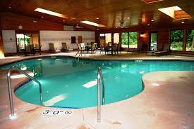 Swimming Pool Captivating Indoor Pools In Mansions With Coffee Table Sets And Lounge Chairs Also Cei Indoor Pool Design Pool Lounge Chairs Pool Patio Furniture