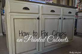 Apply 2nd coat of paint. Thrifty Artsy Girl White Glazed Cabinet Transformations Touch Ups And Maintenance A Year Later
