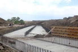 It consists of concrete grade beams and footings connected to pilings that go as far as 20 ft. Foundation Footing Systems Grade Beam Vs Spread Footing Barton Supply