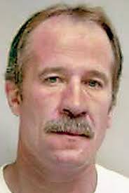 Convicted killer back in custody