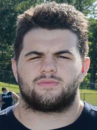 Former McDowell linebacker Heubel is suing over concussion. Here's why