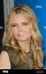 Michelle Pfeiffer at the World Premiere of Warner Brothers Pictures' "New  Year's Eve". Arrivals held at Grauman's Chinese Theatre in Hollywood, CA,  December 5, 2011. Photo by Joe Martinez