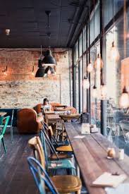 As you start browsing furniture, decorating and wall ideas for your room, think about the space's desired purpose and focus on a few staple items, such as a comfortable sofa and a coffee table, then choose the rest of the accent furniture and wall decor accordingly. 49 Coffee Shop Decorations Ideas Coffee Shop Cafe Design Restaurant Design