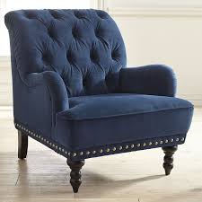 By The Looks Of It Our Chas Armchair Is Something Of An Aristocrat Button Tufted And Upholstered B Blue Velvet Armchair Blue Velvet Chairs Blue Accent Chairs