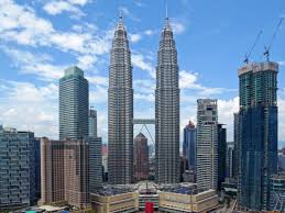 Petronas towers are the twin skyscrapers in kuala lumpur, they are the tallest buildings in malaysia, and were widely known as when petronas towers were completed in 1998, they were declared by ctbuh as the official world's tallest buildings. Petronas Twin Towers Kuala Lumpur Get The Detail Of Petronas Twin Towers On Times Of India Travel