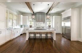 u shaped kitchen with wood ceiling