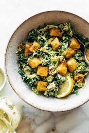 Brussels Kale Caesar With Cheezy Garlic Croutons Pinch Of Yum Recipe Garlic Crouton Clean Eating Recipes Recipes