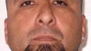 Convict flees halfway house