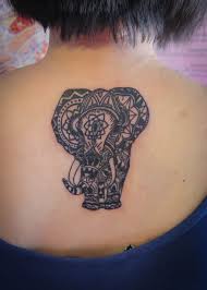 Thai tattoo symbols and meanings. Thai Elephant Tattoo On Upper Back