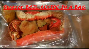 Remove from heat, drain and set aside in a large pan, lay out the oven bag add the cooked potatoes and corn to the bag generously season with old. Oven Bag Crab Legs