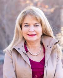 Battalion Chief Carl Crook—shown here with his wife Veronica Martinez and  their wonderful family—retired this week after two decades of dedicated  service to the people of Santa Fe. Thank you, Chief Crook!