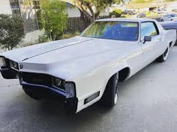 Image result for Patina Silver 1969 Cadillac