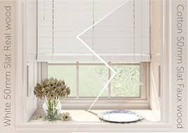 Our ready made venetian blinds are easy to fit and look particularly impactful in bedrooms, living rooms, kitchens and conservatories. Differences Between Real And Faux Wood Venetian Blinds Dotcomblinds