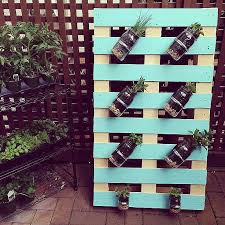 You can use the pallet to make a shelf and then add a herb garden to it by placing the herb seeds into small glass mason jars. Diy Pallet Mason Jar Herb Garden Tutorial Hello Creative Family