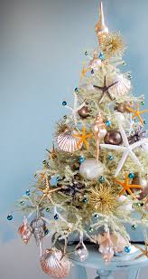 Create a starfish garland, or purchase one here! The Most Marvellous Mini Beach Christmas Trees By Tree Decorator Darryl Moland Beach Bliss Living Christmas Tree Themes Christmas Tree Decorating Themes Beach Christmas Trees