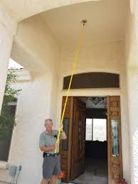 Depending on how high the ceiling is, you may still need a ladder to change the lights in high vaulted ceilings! Commercial Electric 11 Ft Pole Light Bulb Changer Kit With Attachments Ce 600sdlb12 The Home Depot