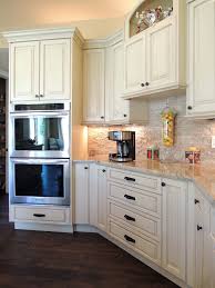However, white is a neutral color that can combine with another color such as black, gray, and beige such as shown in the picture. Antique White Kitchen Houzz