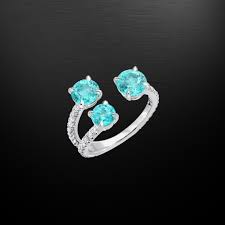 What makes paraiba tourmalines unique? Brazil Paraiba Tourmaline Diamond Platinum Ring Merkaba Jewelry