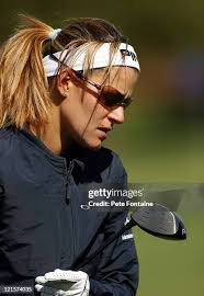 Emilee Klein enjoying practice day at the 2004 Michelob Ultra Open. News  Photo
