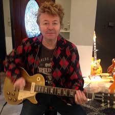 Here's Brian Setzer in a photo taken...
