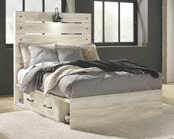 The wispy white finish over a replicated oak grain adds a unique touch to the cambeck bedroom set. The Cambeck Whitewash Full Panel Bed With 2 Storages Available At Logan Furniture Serving Dorchester Ma