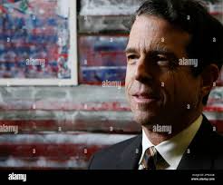 Immigration attorney Tim Barker, partner at the law firm Fragomen, Del Rey,  Bernsen & Loewy, LLP poses for a photo at his office in Los Angeles